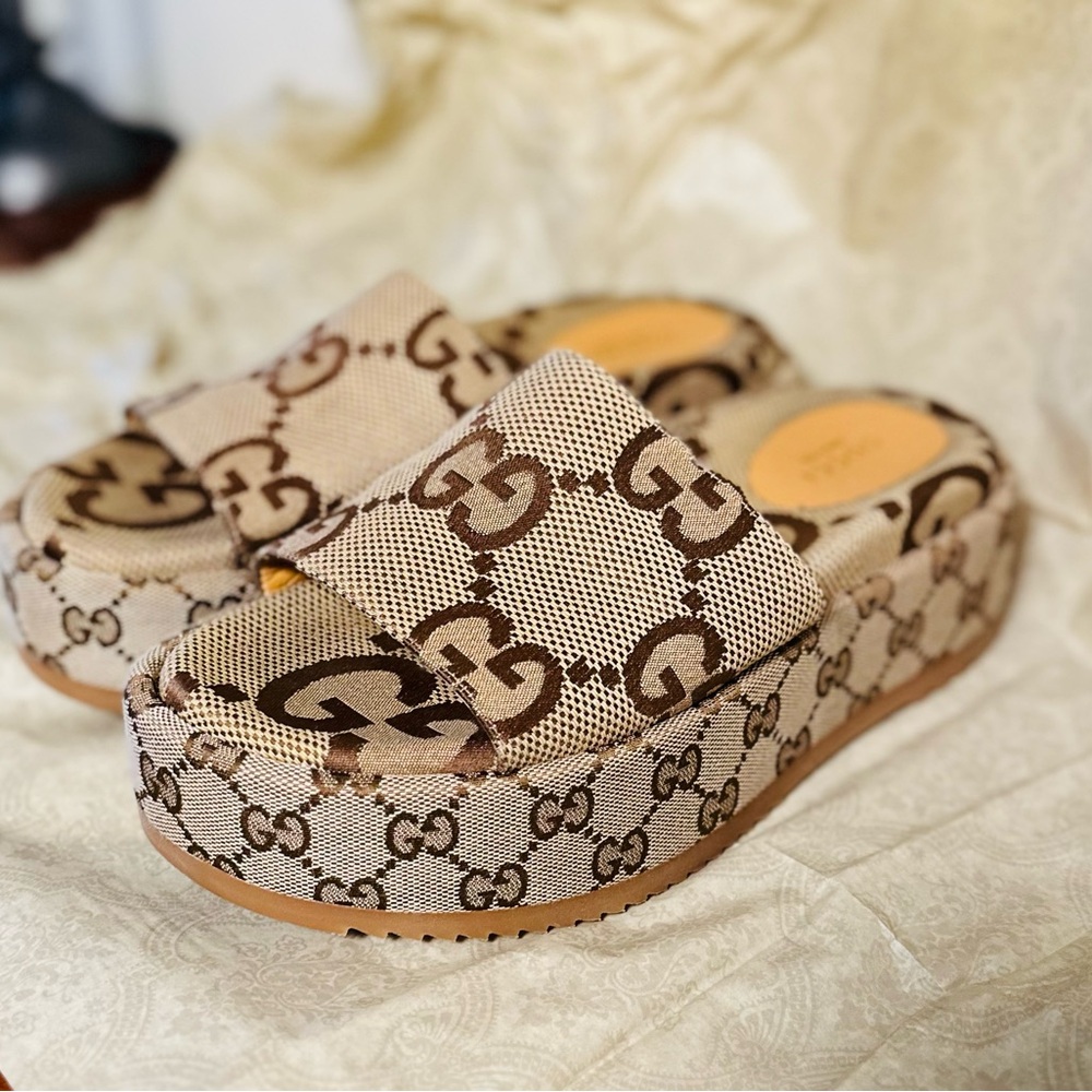 Gucci Brown Monogram Platform Sandals.
